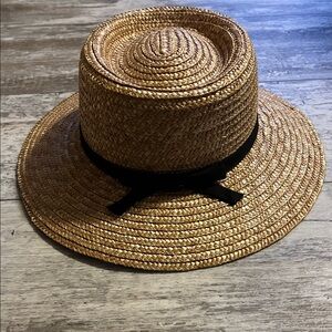 Elegant Tan Straw Hat with Black Ribbon